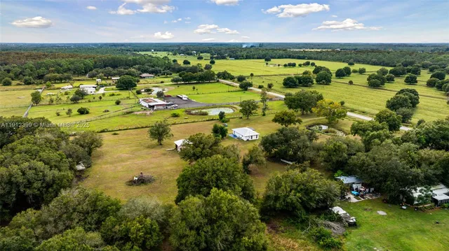 a view of a house with a big yard
