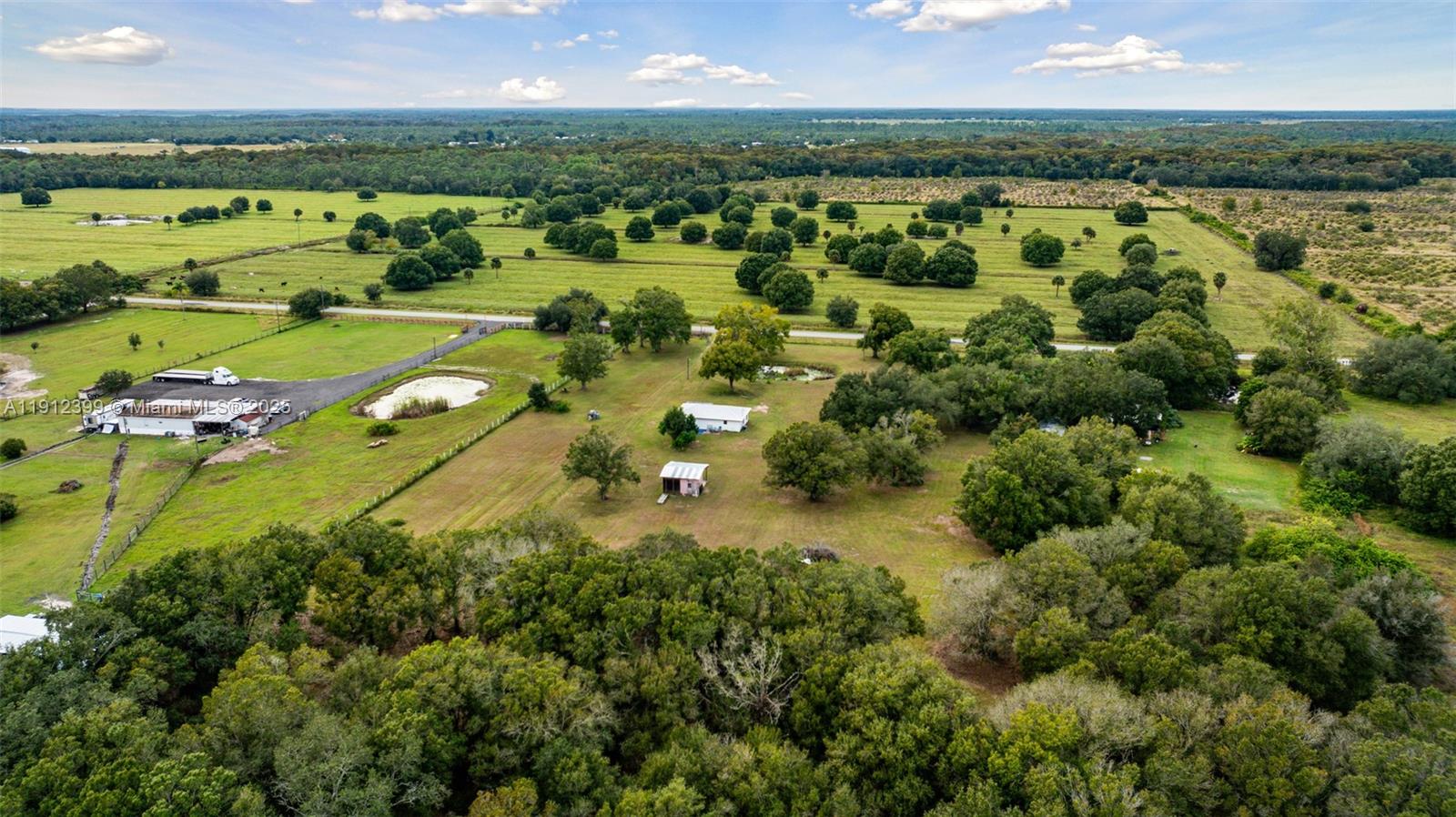 2404 Silver Lake Road LaBelle, FL 33935 - Photo 20 of 89 an aerial view of a city