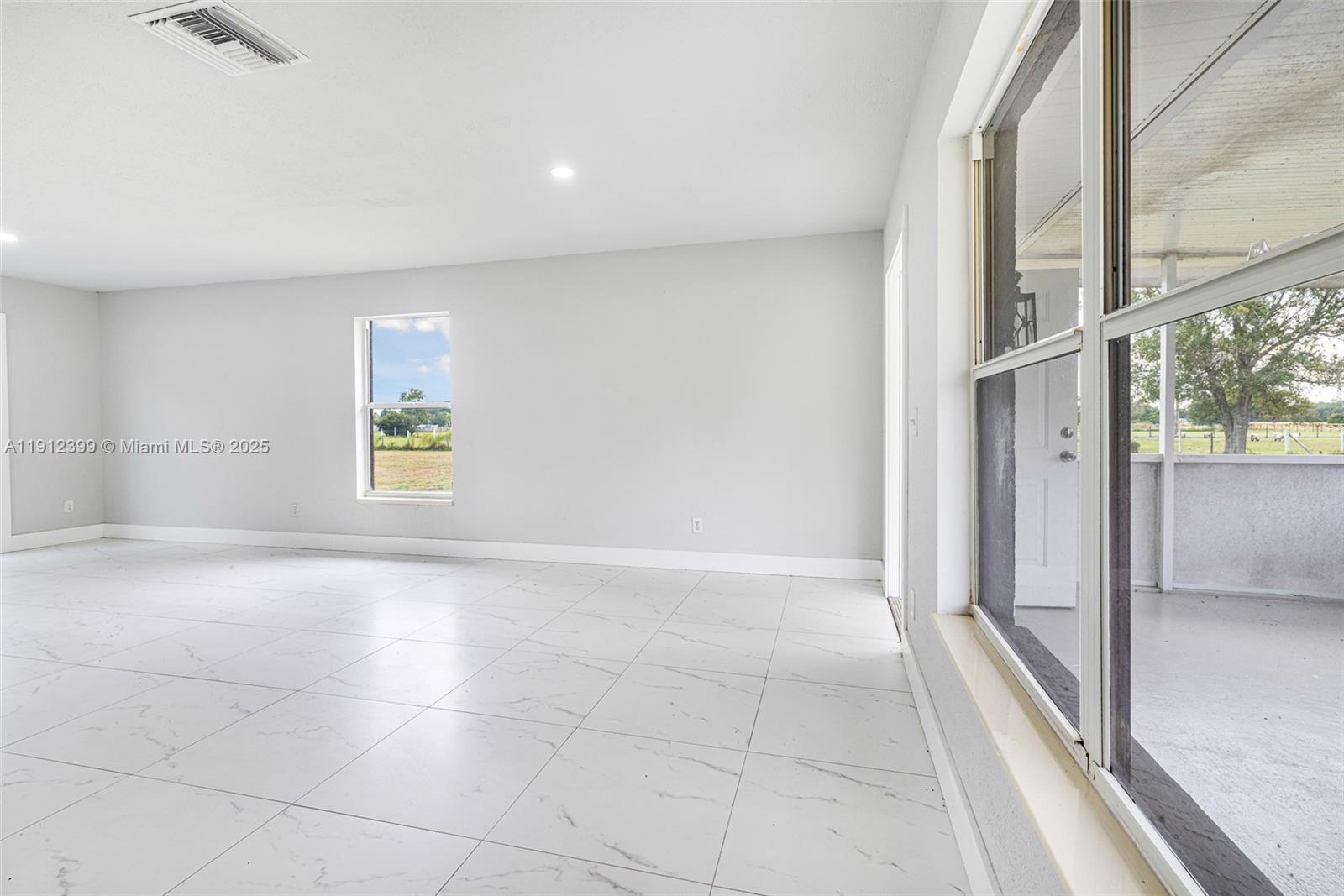 2404 Silver Lake Road LaBelle, FL 33935 - Photo 54 of 89 a view of an empty room and a window
