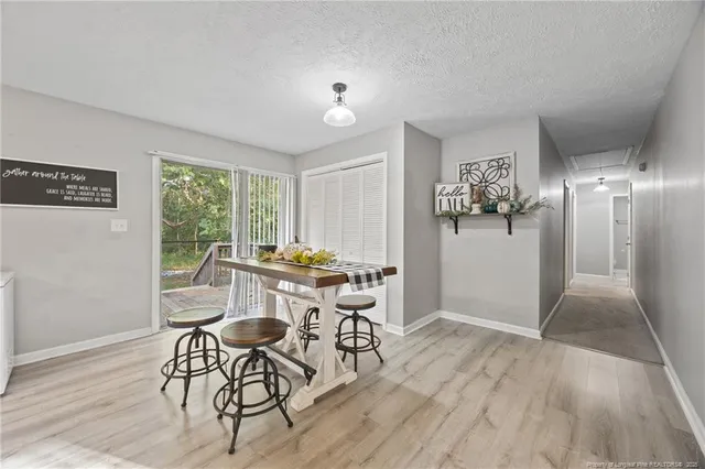 a workspace with furniture hardwood and a window