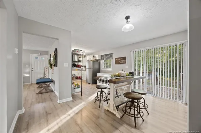 a room with furniture and wooden floor