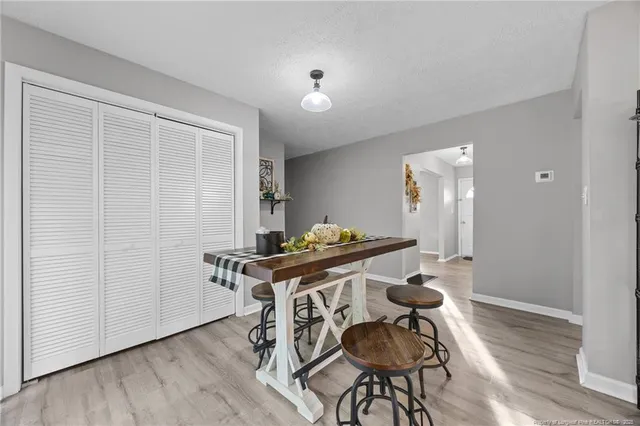 a table and chairs in a room
