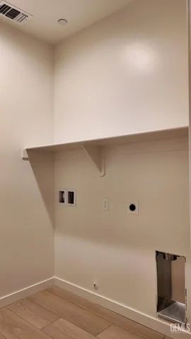 an empty room with a wooden floor