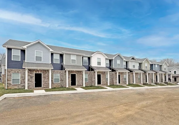 front view of a house with a street