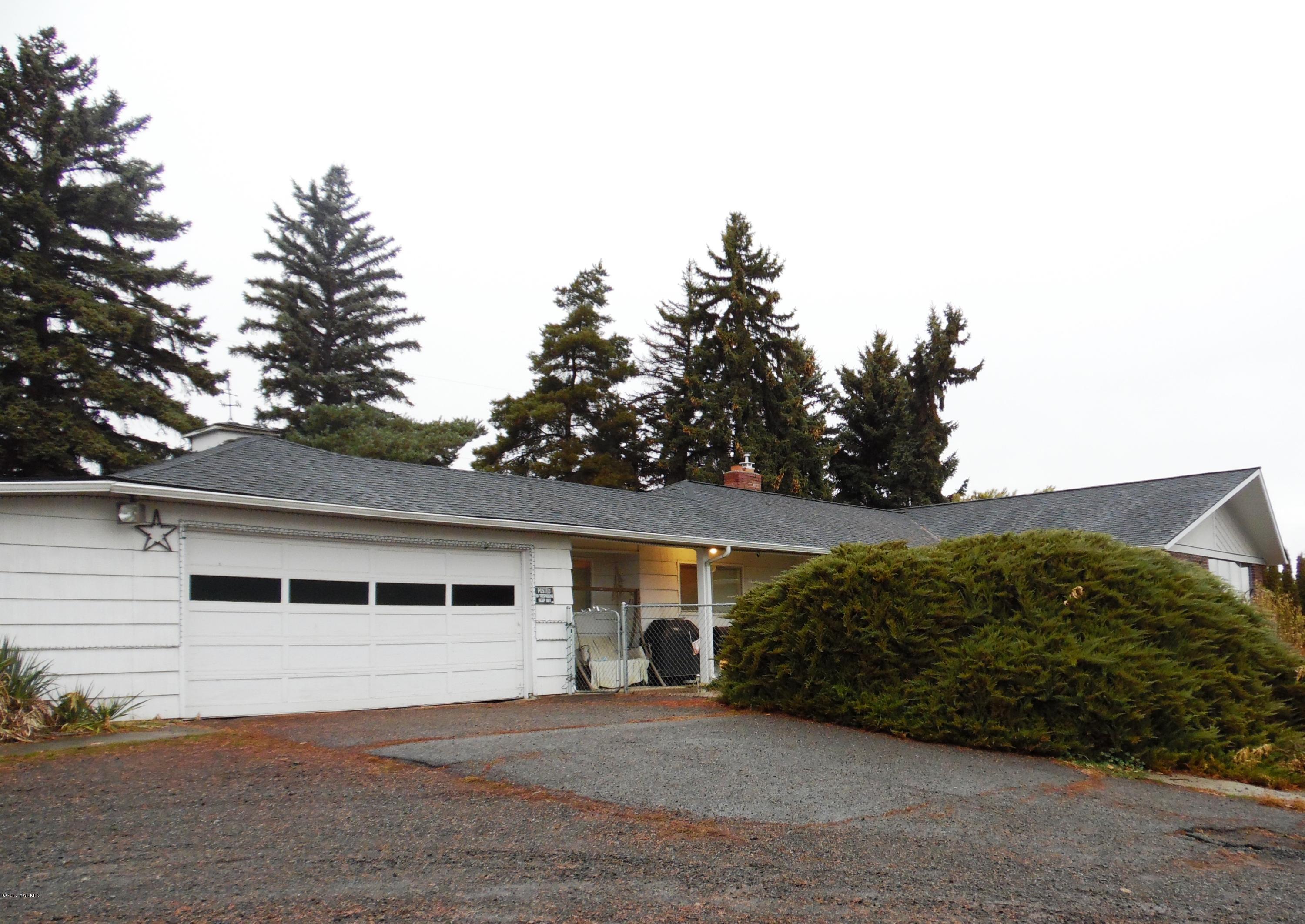 220 Rosenkranz Road Tieton, WA 98947 - Photo 1 of 48 a front view of a house with a garage