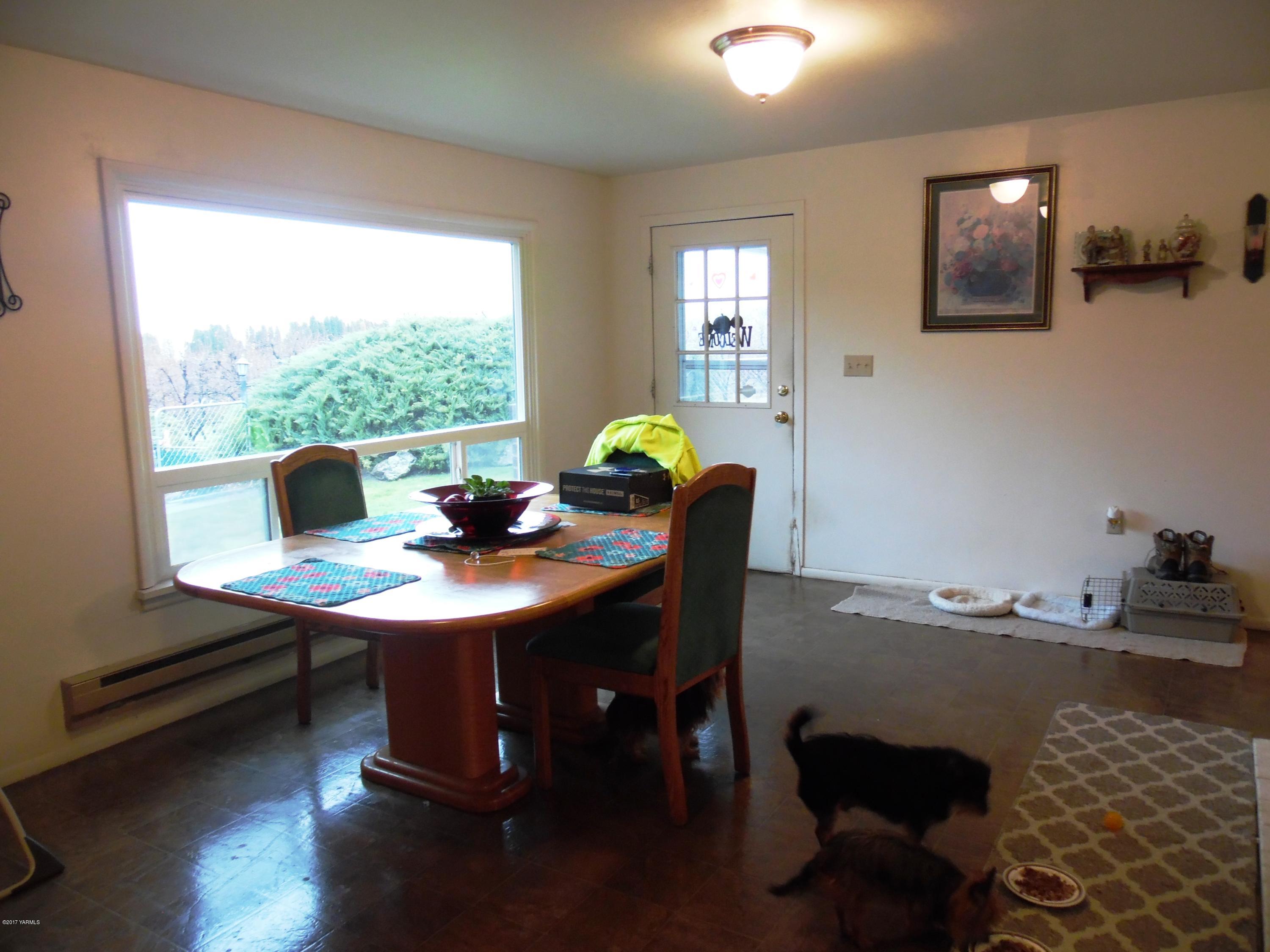 220 Rosenkranz Road Tieton, WA 98947 - Photo 17 of 48 a view of a workspace with furniture and a window