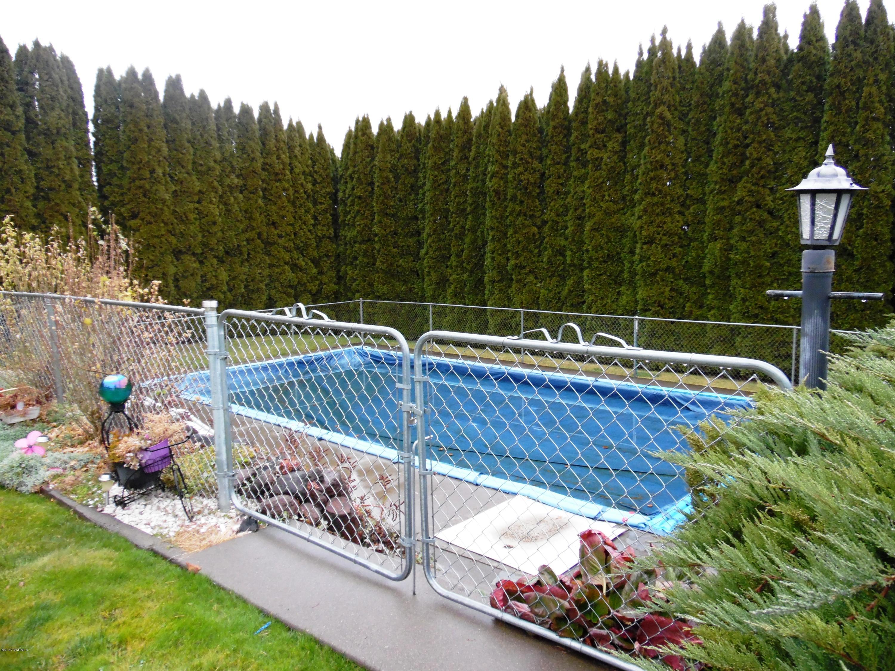 220 Rosenkranz Road Tieton, WA 98947 - Photo 6 of 48 a view of a roof deck with wooden fence