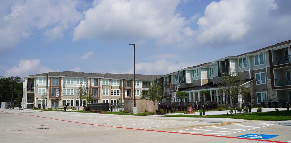a front view of a building with street view