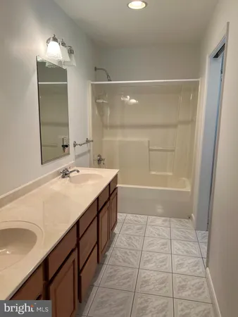 a white toilet sitting next to a window