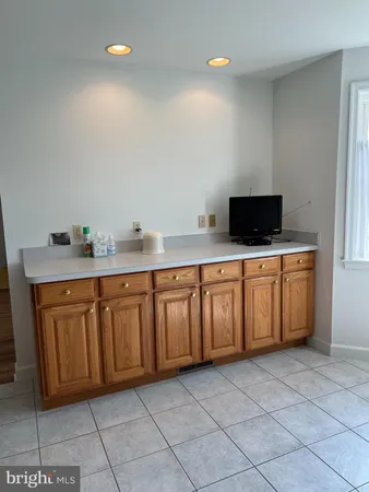 a kitchen with a sink and a window