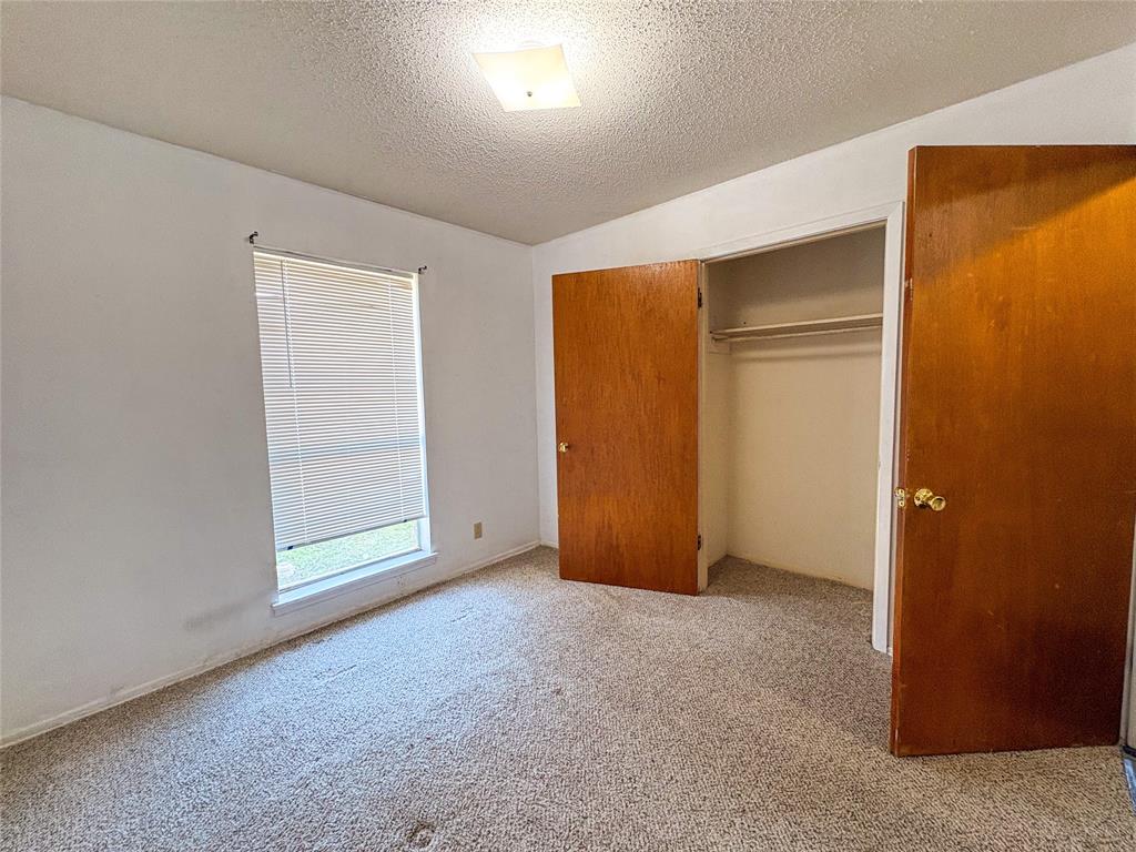 1829 South Center Street Denison, TX 75021 - Photo 22 of 29 an empty room with closet area