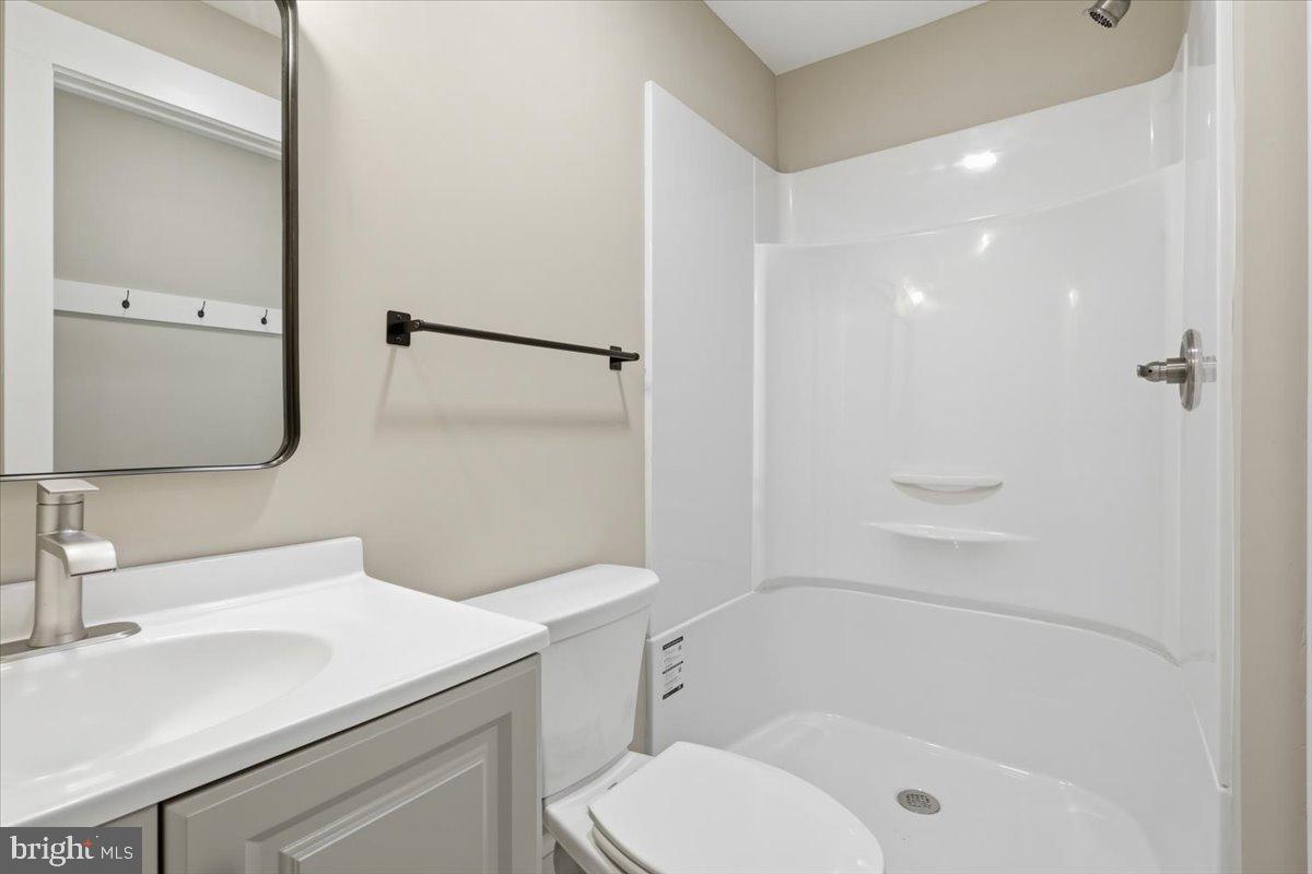 628 Trail Avenue Frederick, MD 21701 - Photo 12 of 37 a bathroom with a sink toilet and shower