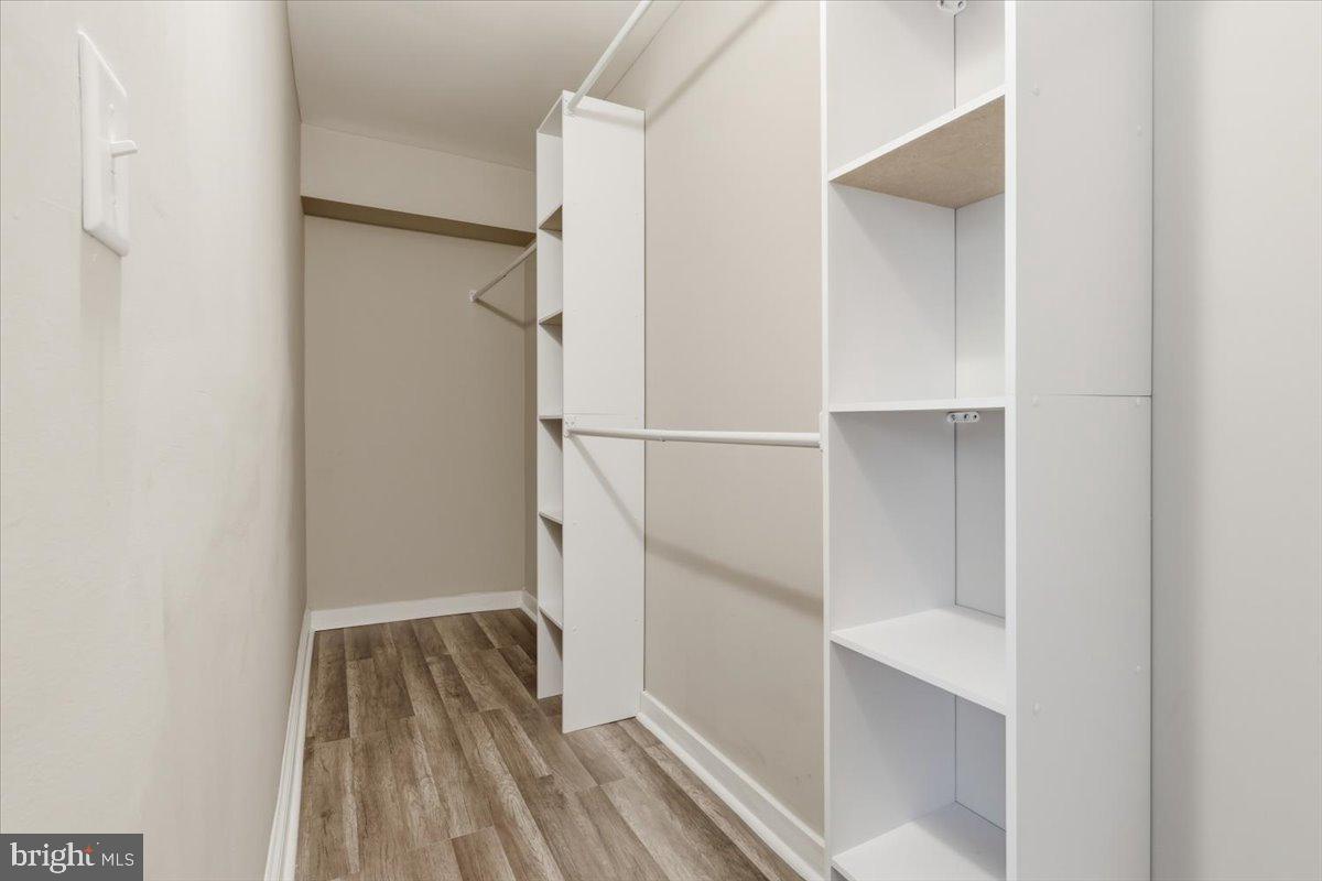 628 Trail Avenue Frederick, MD 21701 - Photo 21 of 37 a view of walk in closet with empty racks