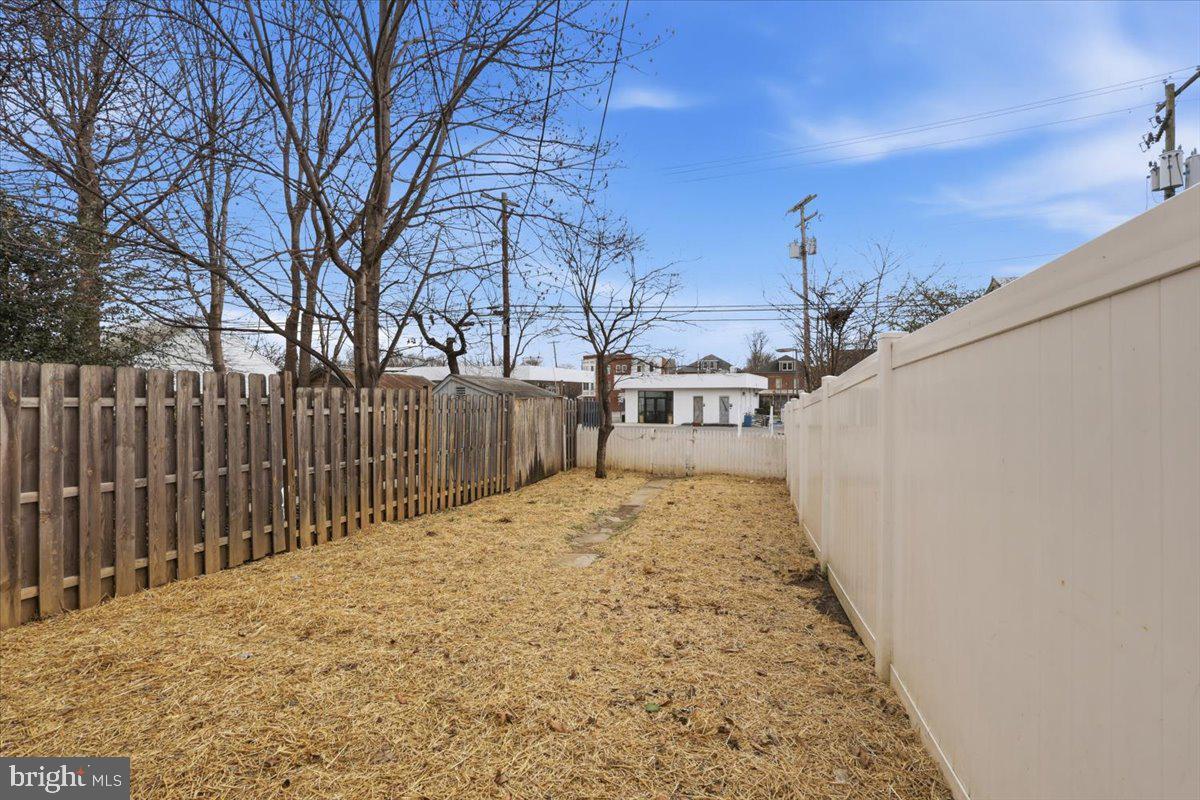 628 Trail Avenue Frederick, MD 21701 - Photo 27 of 37 a view of a backyard with wooden fence