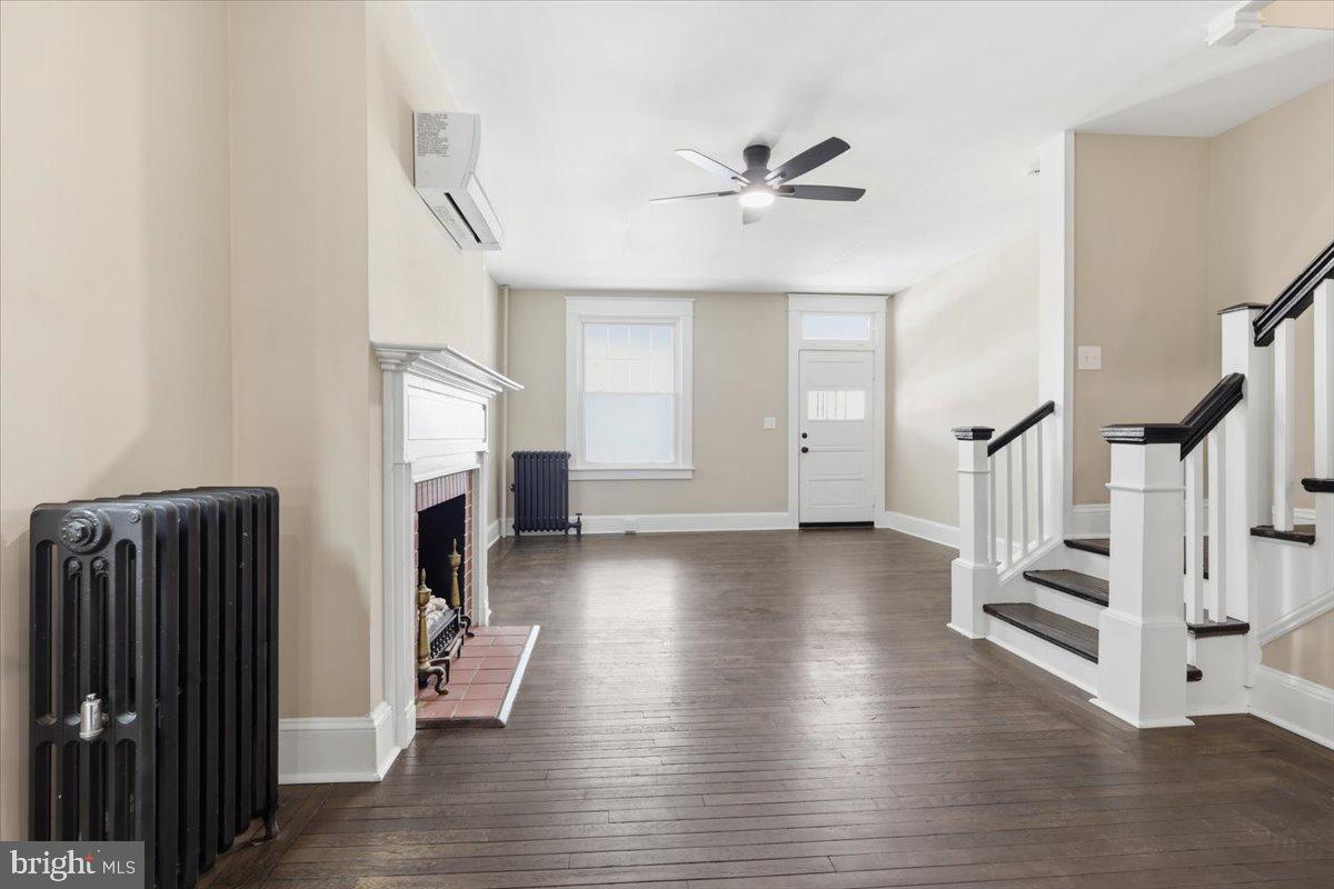 628 Trail Avenue Frederick, MD 21701 - Photo 6 of 37 a view of entryway and hall with wooden floor