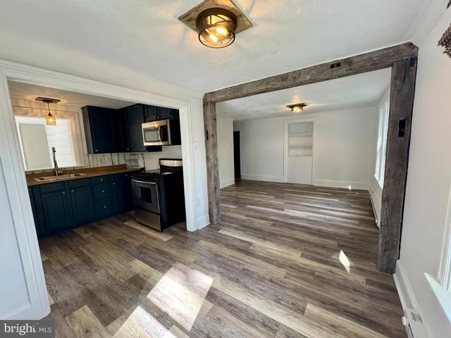 a view of kitchen and a sink