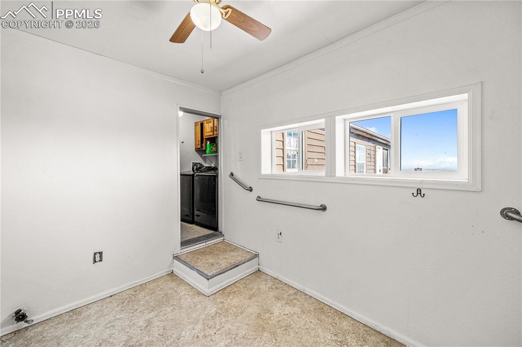 8435 Savage Road Beulah, CO 81023 - Photo 20 of 34 wooden floor in an empty room with a window
