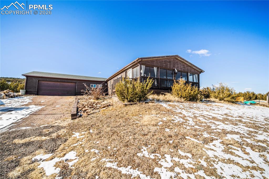 8435 Savage Road Beulah, CO 81023 - Photo 2 of 34 a front view of a house with a yard