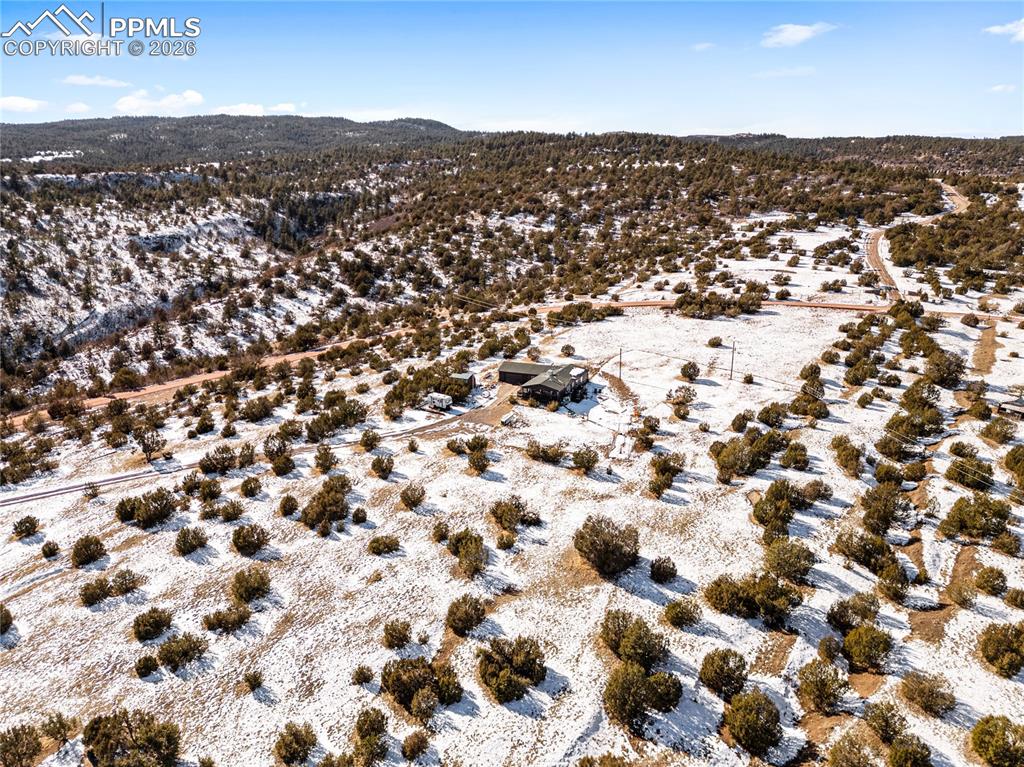 8435 Savage Road Beulah, CO 81023 - Photo 31 of 34 an aerial view of residential houses with parking space
