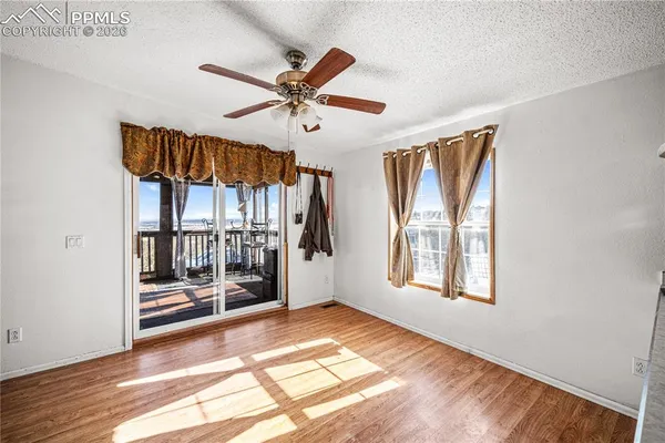 a view of an empty room and window