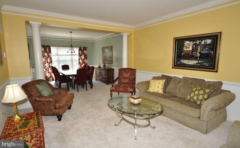 1338 Dasher Lane Reston, VA 20190 - Photo 20 of 24 a living room with furniture