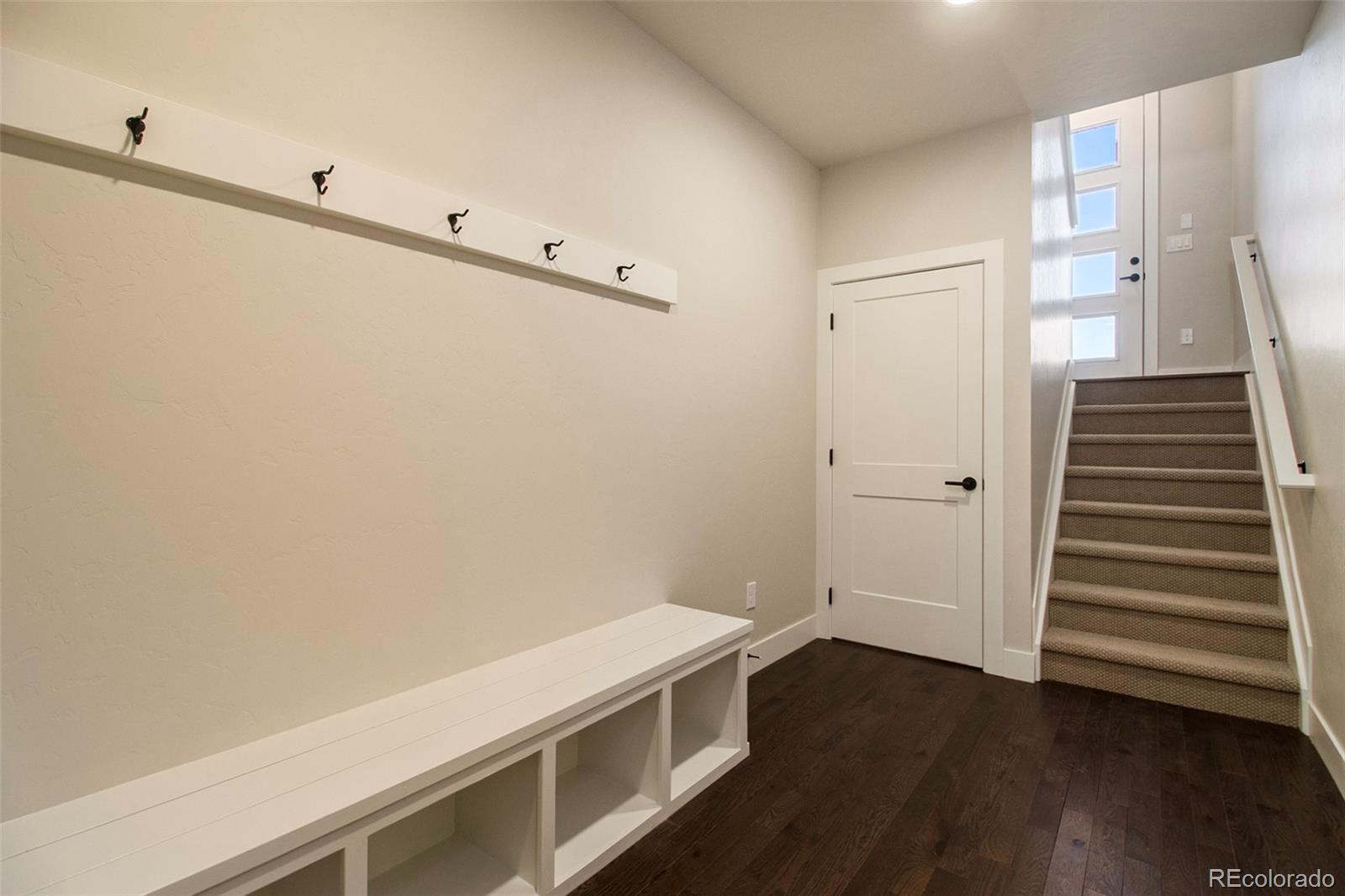 98 High Grove Loop Winter Park, CO 80482 - Photo 19 of 24 a view of an empty room with wooden floor