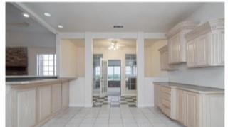 1191 Pasewark Circle Prosper, TX 75078 - Photo 11 of 20 a view of a kitchen with a sink and cabinets