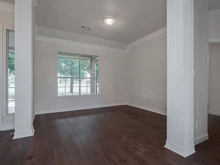1191 Pasewark Circle Prosper, TX 75078 - Photo 3 of 20 an empty room with wooden floor and windows