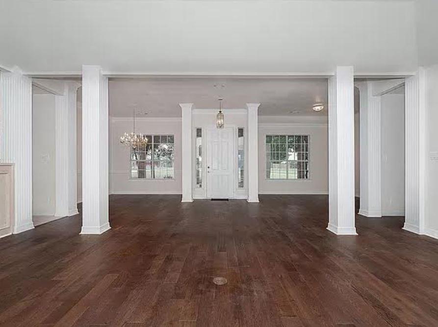 1191 Pasewark Circle Prosper, TX 75078 - Photo 4 of 20 an empty room with wooden floor and windows