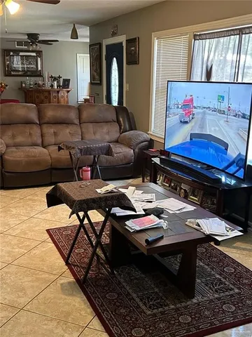 a kitchen with a stove a sink and a refrigerator