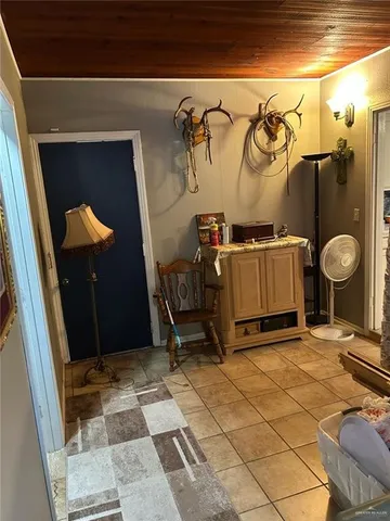 a bed room with a bed and a dresser