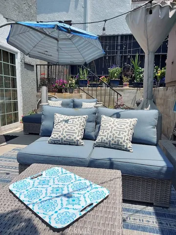 a living room with furniture and a table