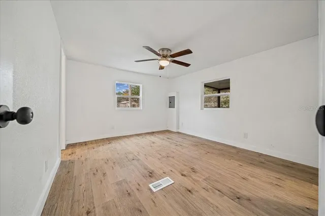 a bathroom with a toilet and shower