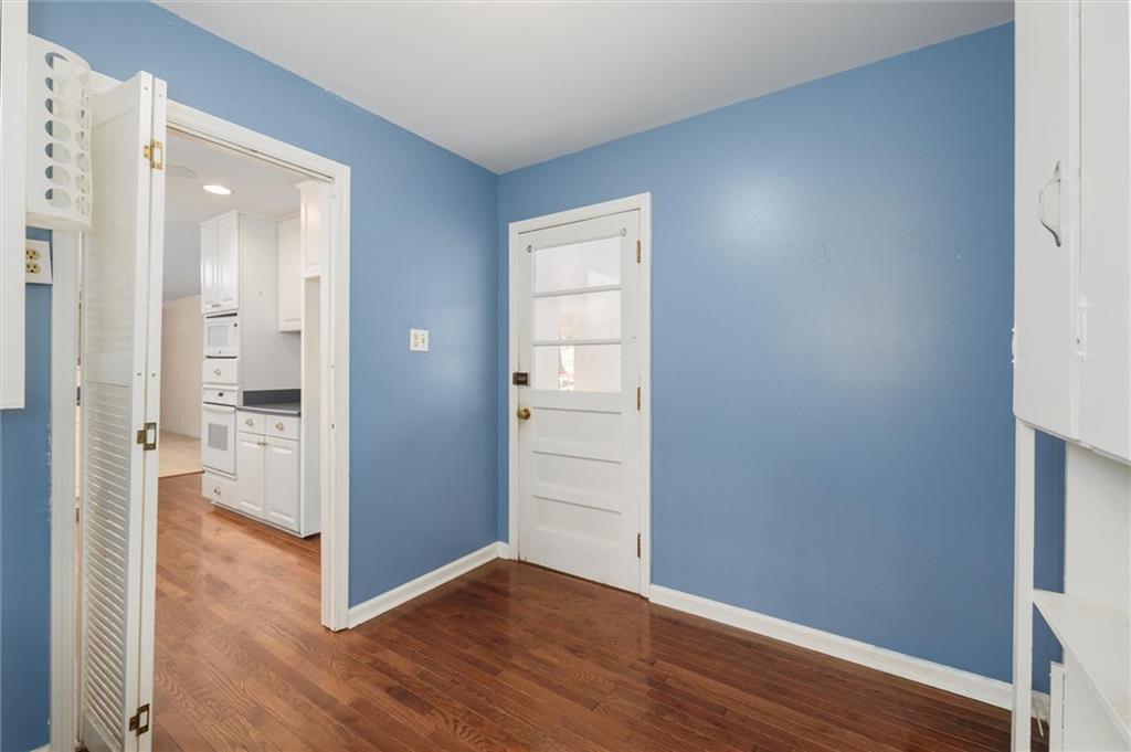 2350 Oxbow Circle Smoke Rise, GA 30087 - Photo 16 of 51 wooden floor in an empty room