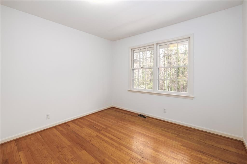 2350 Oxbow Circle Smoke Rise, GA 30087 - Photo 26 of 51 an empty room with a window