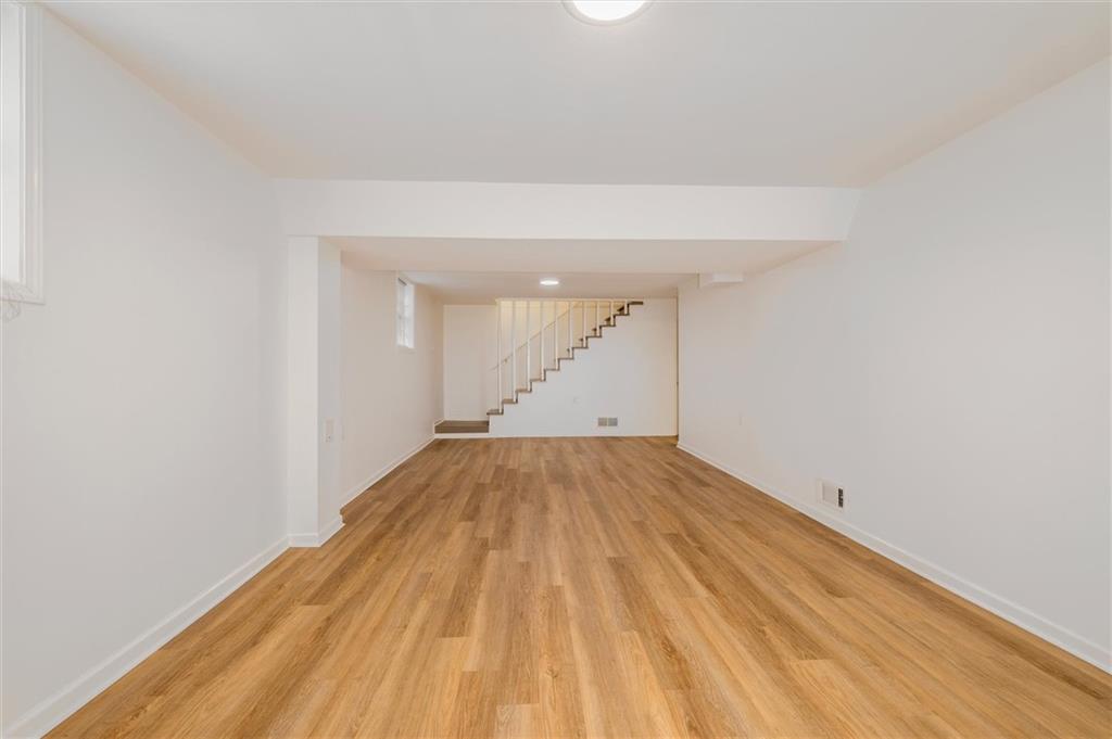 2350 Oxbow Circle Smoke Rise, GA 30087 - Photo 40 of 51 a view of empty room with wooden floor