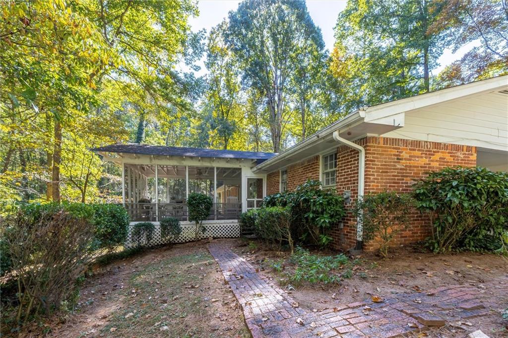 2350 Oxbow Circle Smoke Rise, GA 30087 - Photo 45 of 51 a view of a house with backyard and garden
