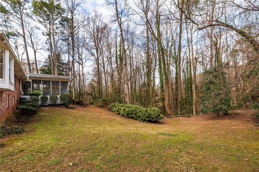2350 Oxbow Circle Smoke Rise, GA 30087 - Photo 50 of 51 a view of a yard with plants and trees
