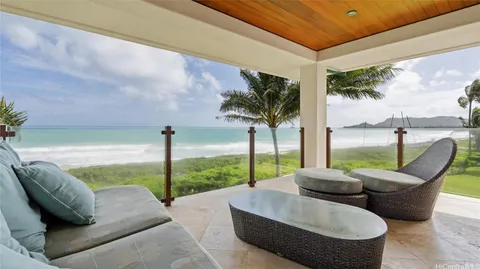 a outdoor living space with patio furniture and a garden