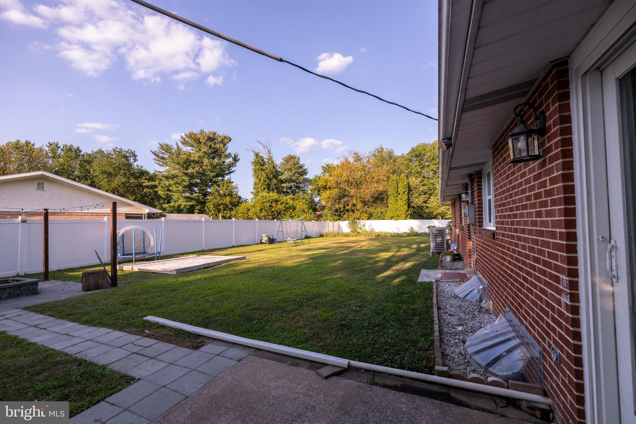 1504 Pelham Road Harrisburg, PA 17110 - Photo 29 of 31 Spacious backyard with serene greenery.