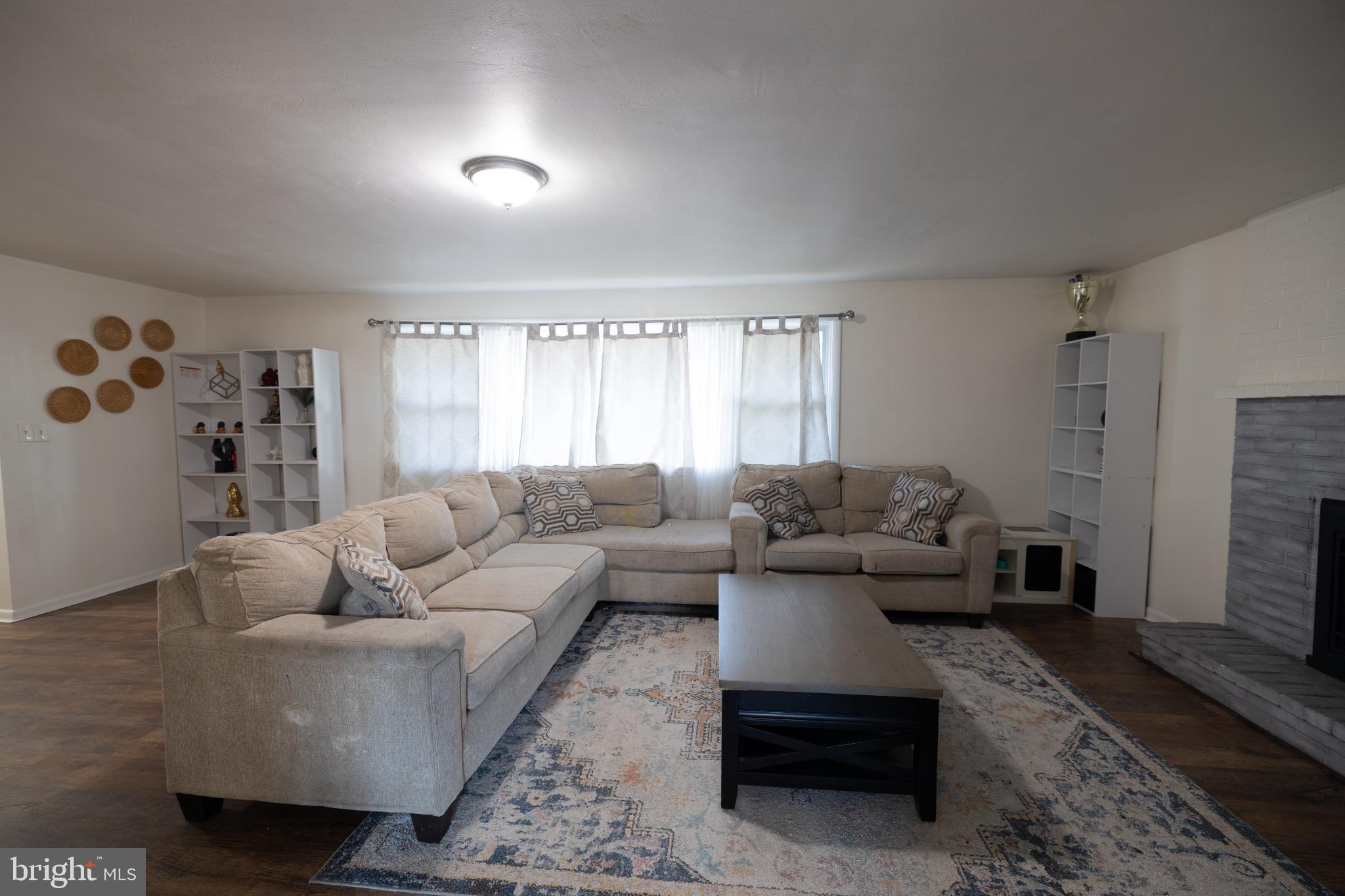 Spacious living area with natural light.
