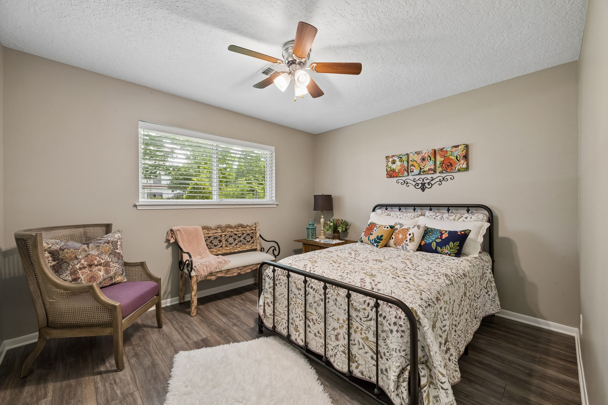 2102 Casa Rio Circle Dickinson, TX 77539 - Photo 13 of 22 One of two secondary bedrooms offering generous proportions, abundant natural light, and a bright, airy atmosphere. Neutral finishes create a timeless backdrop ready for any décor style. *** Bonus ~ Large walk in closet***
