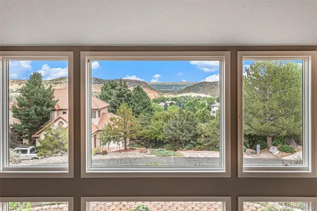 a bedroom with a bed and a fireplace