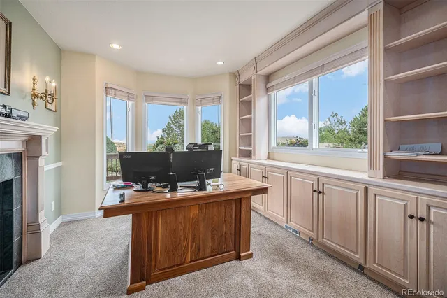 a bathroom with a toilet a sink and a mirror