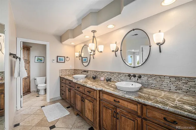 a bathroom with a sink and a shower