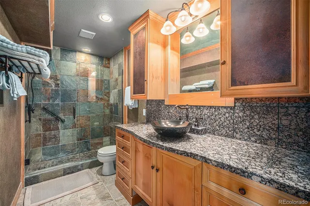 a bedroom with a bed chair and window