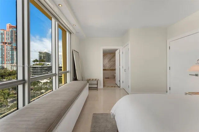 a bathroom with a shower and a sink