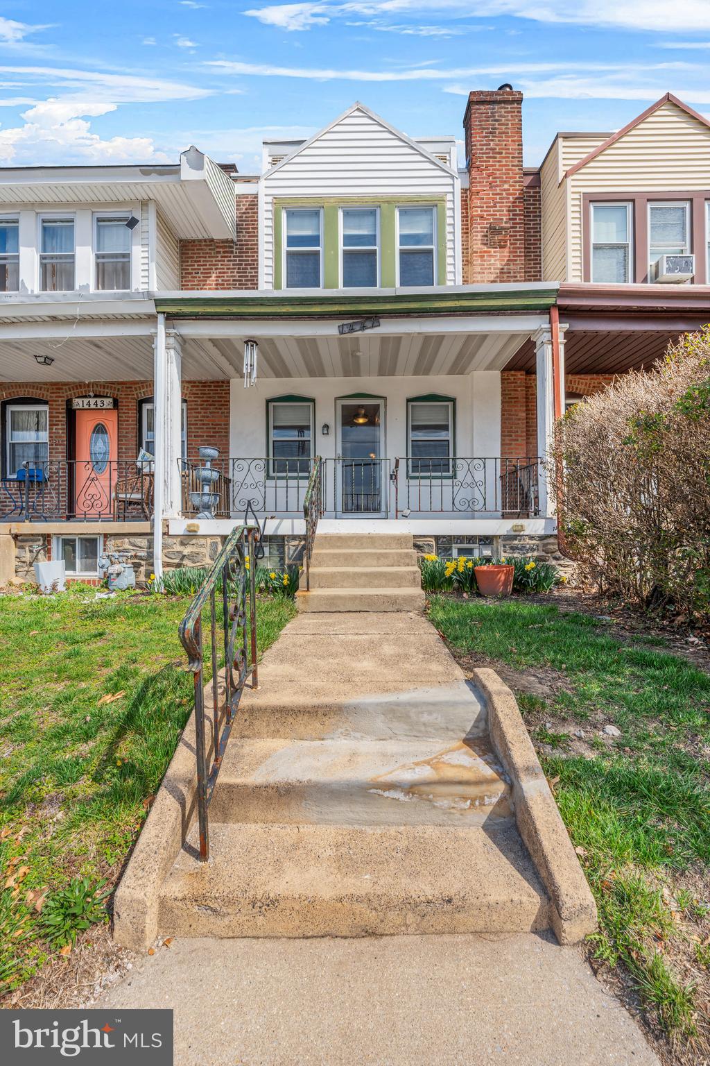 1441 Lawrence Road Havertown, PA 19083 - Photo 2 of 13 a front view of a residential apartment building with a yard