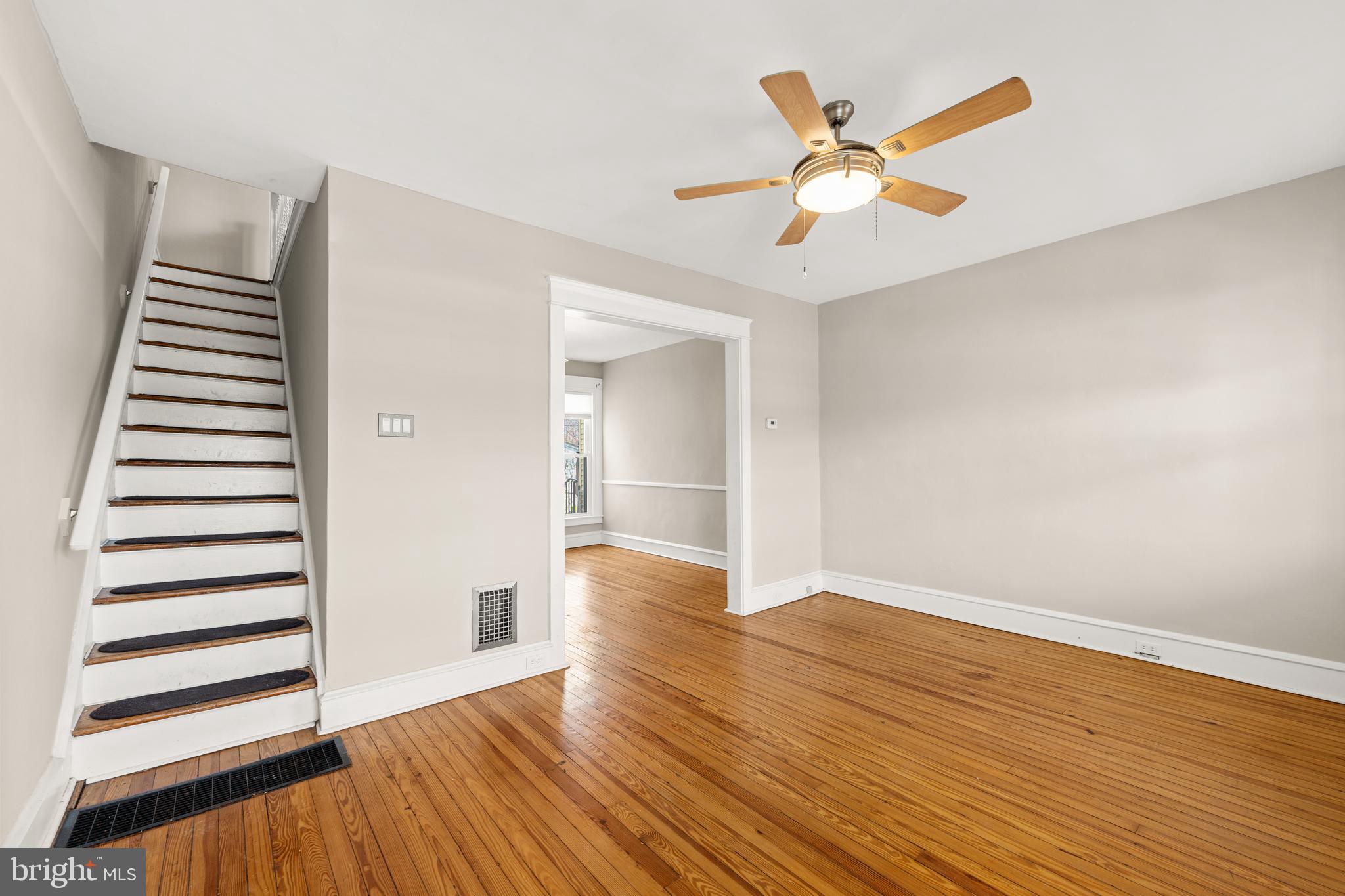 1441 Lawrence Road Havertown, PA 19083 - Photo 4 of 13 wooden floor in an empty room with a window