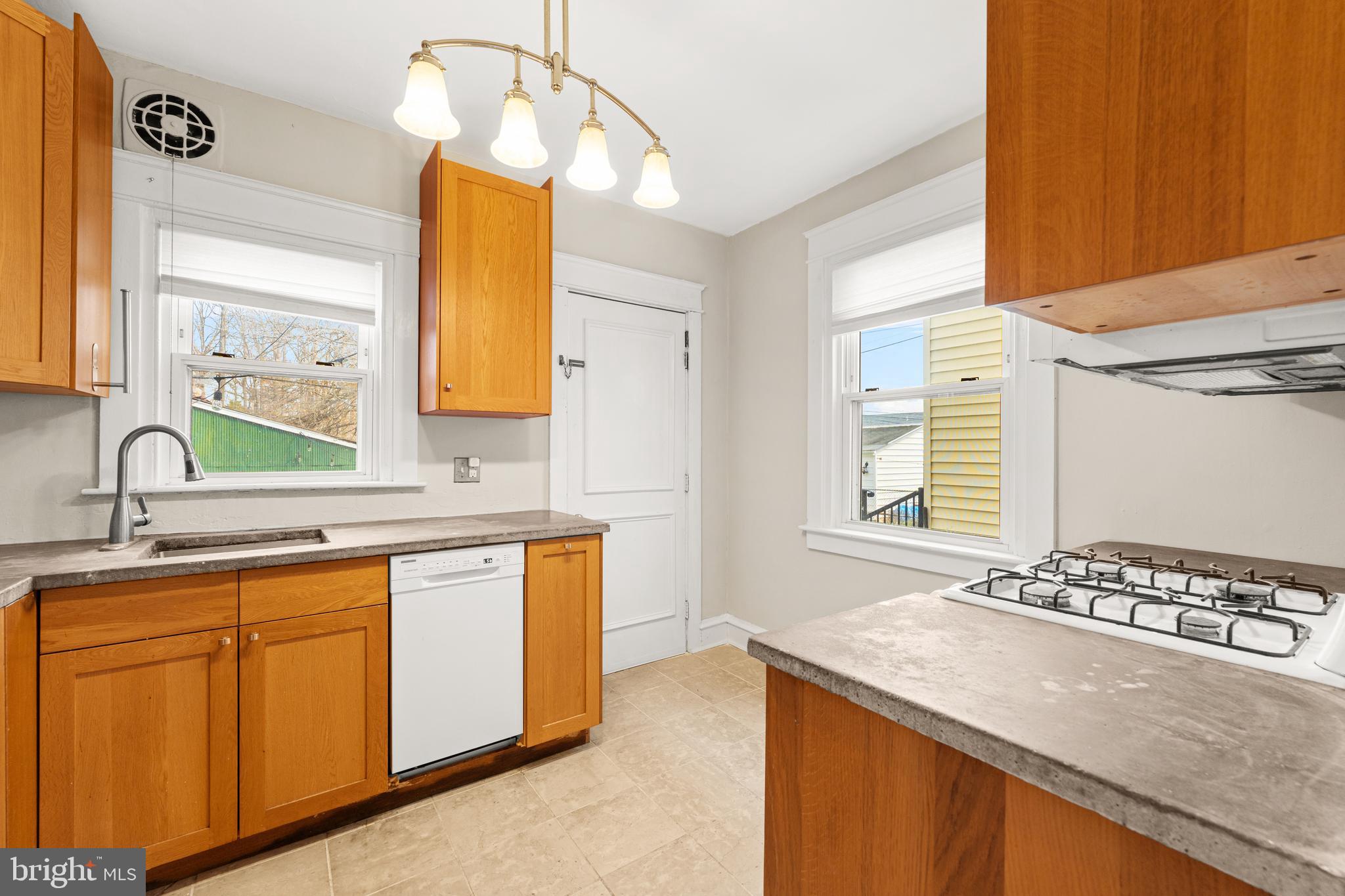 1441 Lawrence Road Havertown, PA 19083 - Photo 5 of 13 a bathroom with a granite countertop sink and a mirror